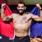 Benoît Saint Denis avec le drapeau Français